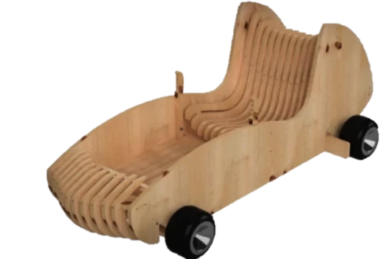 Wooden car built from CNC-cut plywood ribs on black wheels
