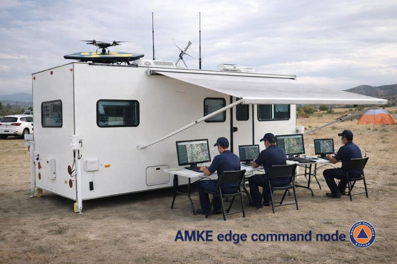 Mobile operations centre trailer with antennas, drone and field operators (visualisation)