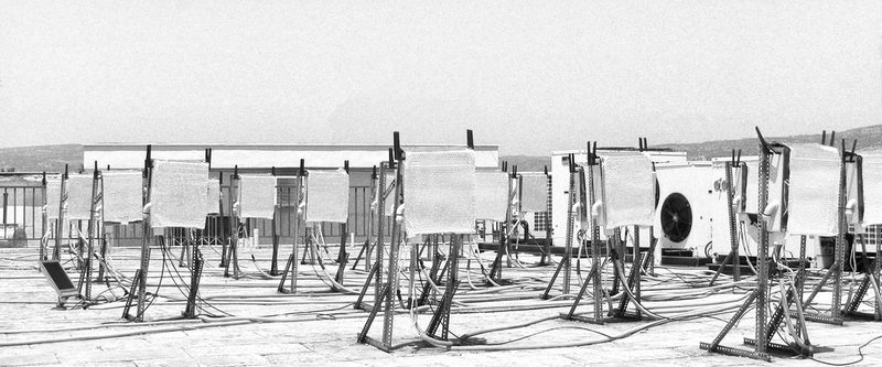 NITOS outdoor testbed: wireless nodes on masts on a rooftop